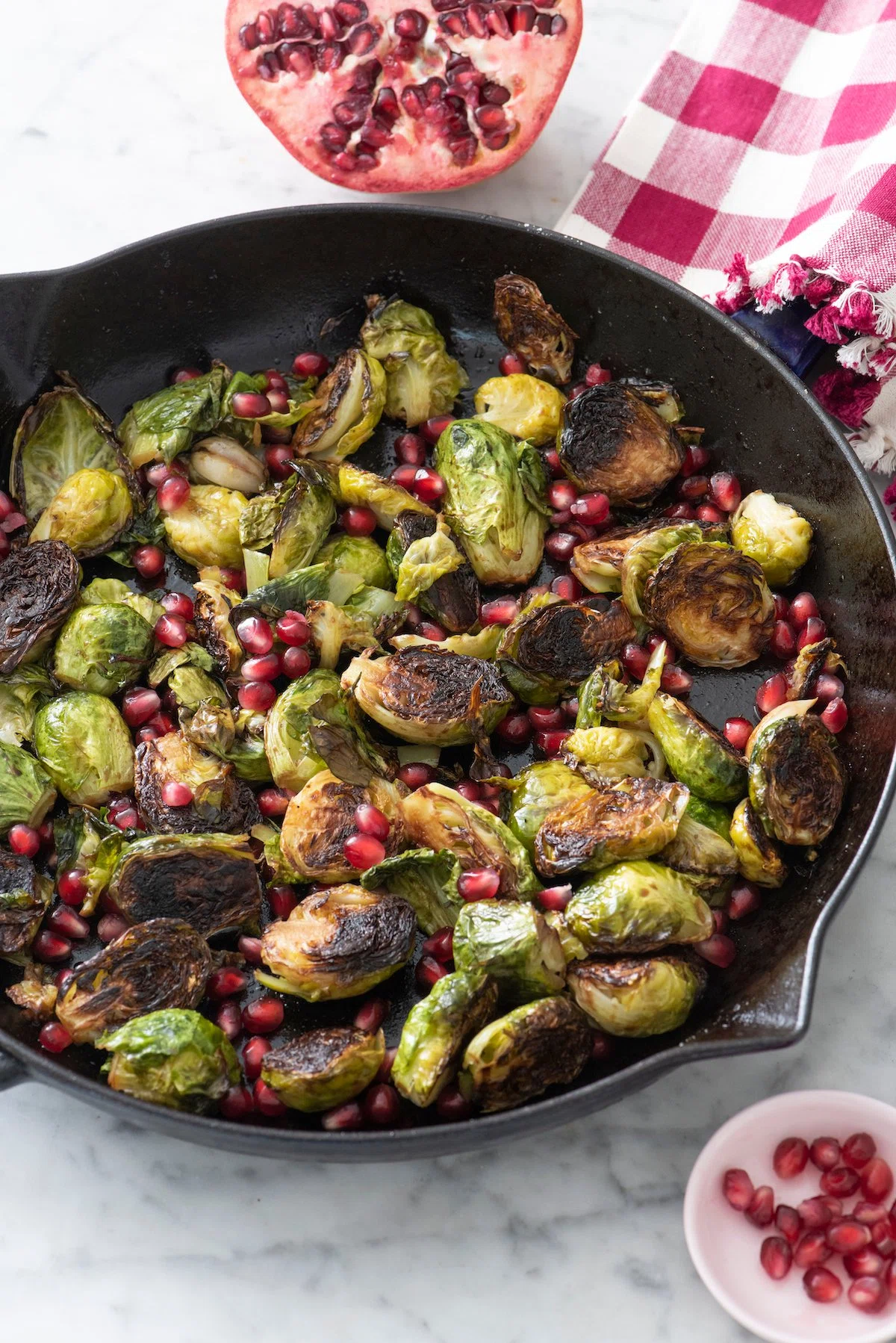 Cast Iron Brussels Sprouts with Pomegranate and Garlic