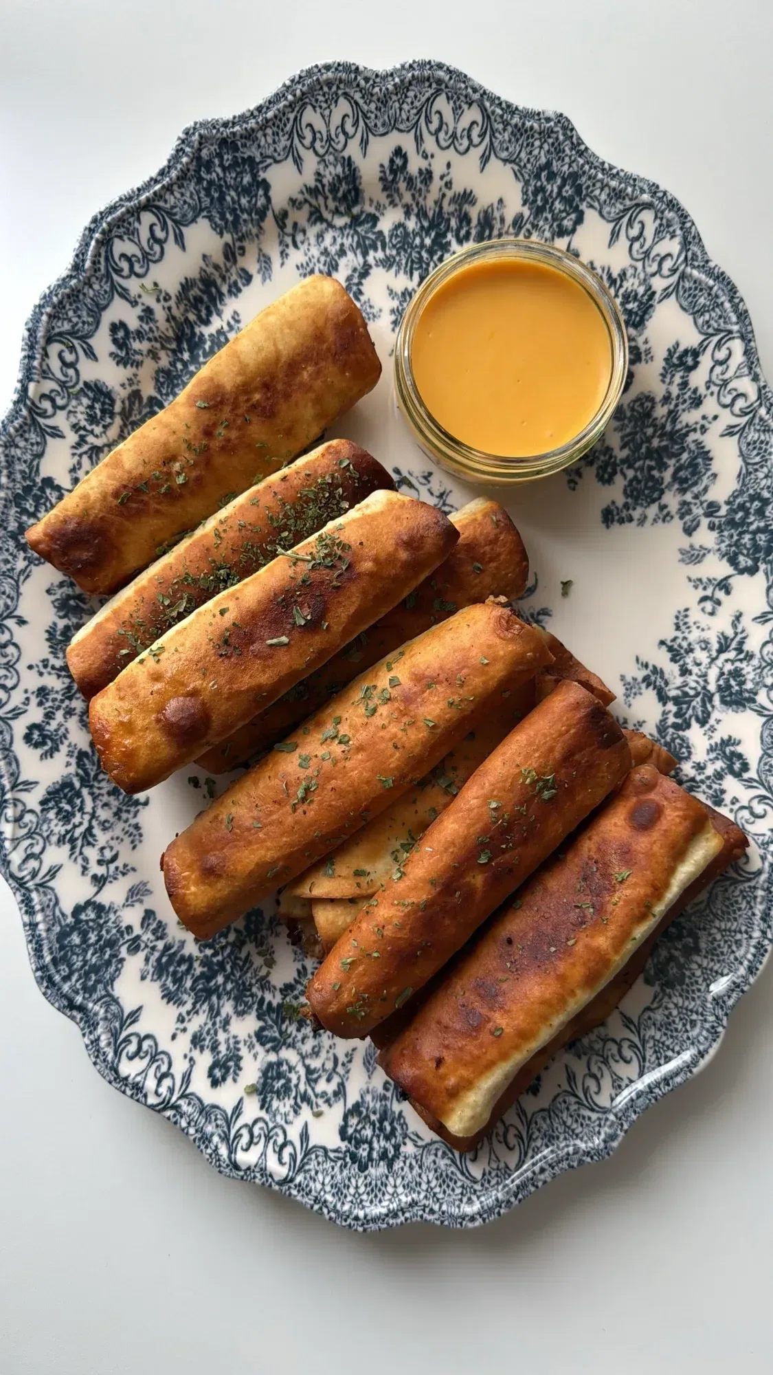 Cheesy Beef Taquitos with Cheddar Sauce