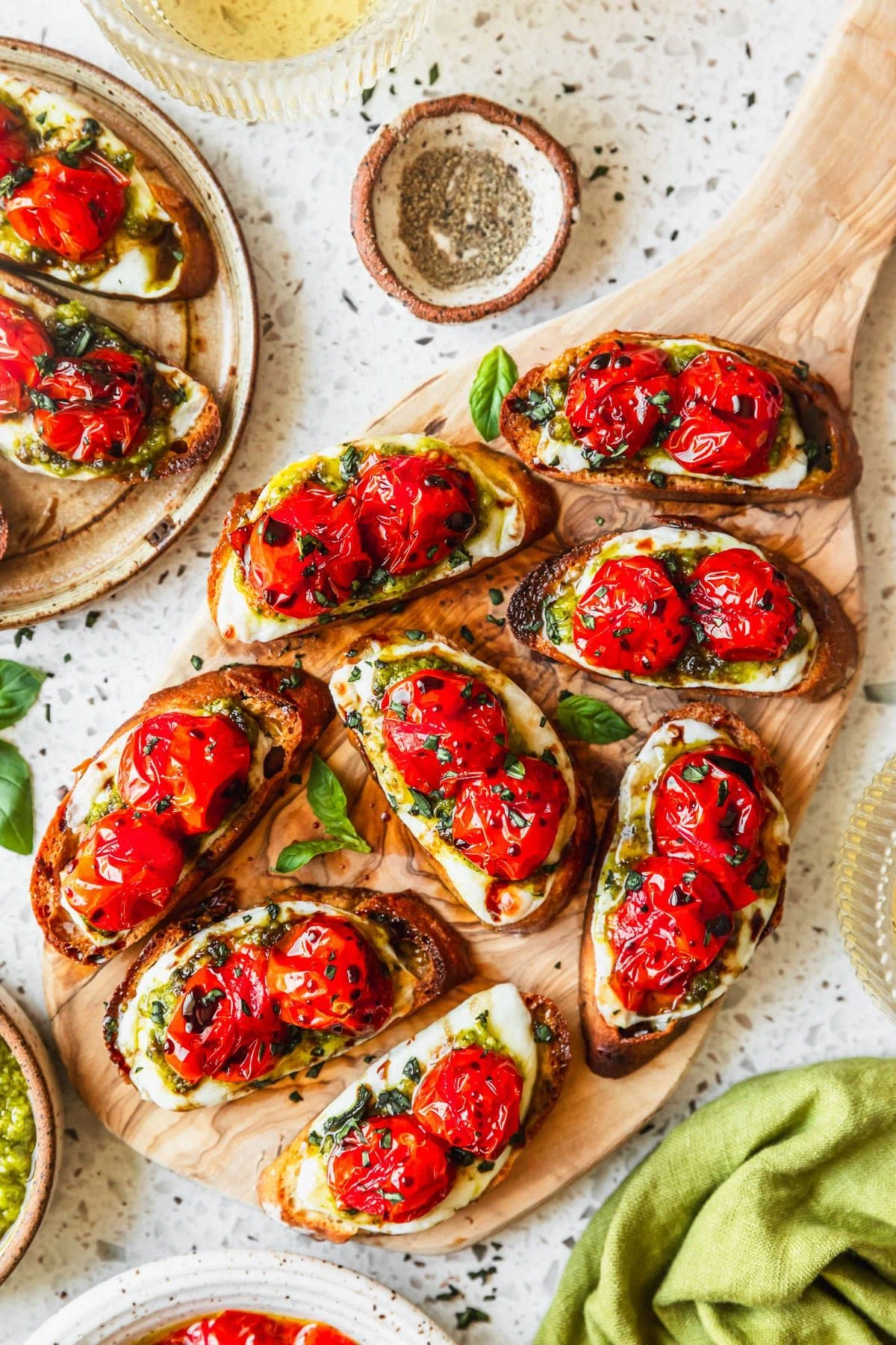 Baked Caprese Crostini with Pesto