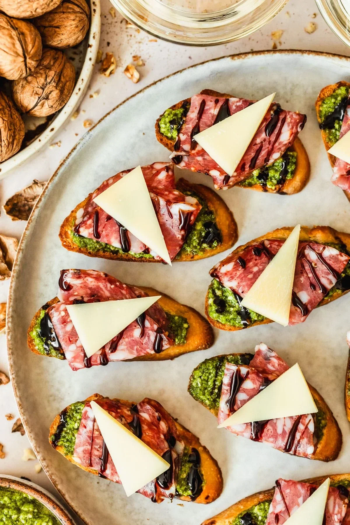 Pesto Crostini with Parmesan & Soppressata