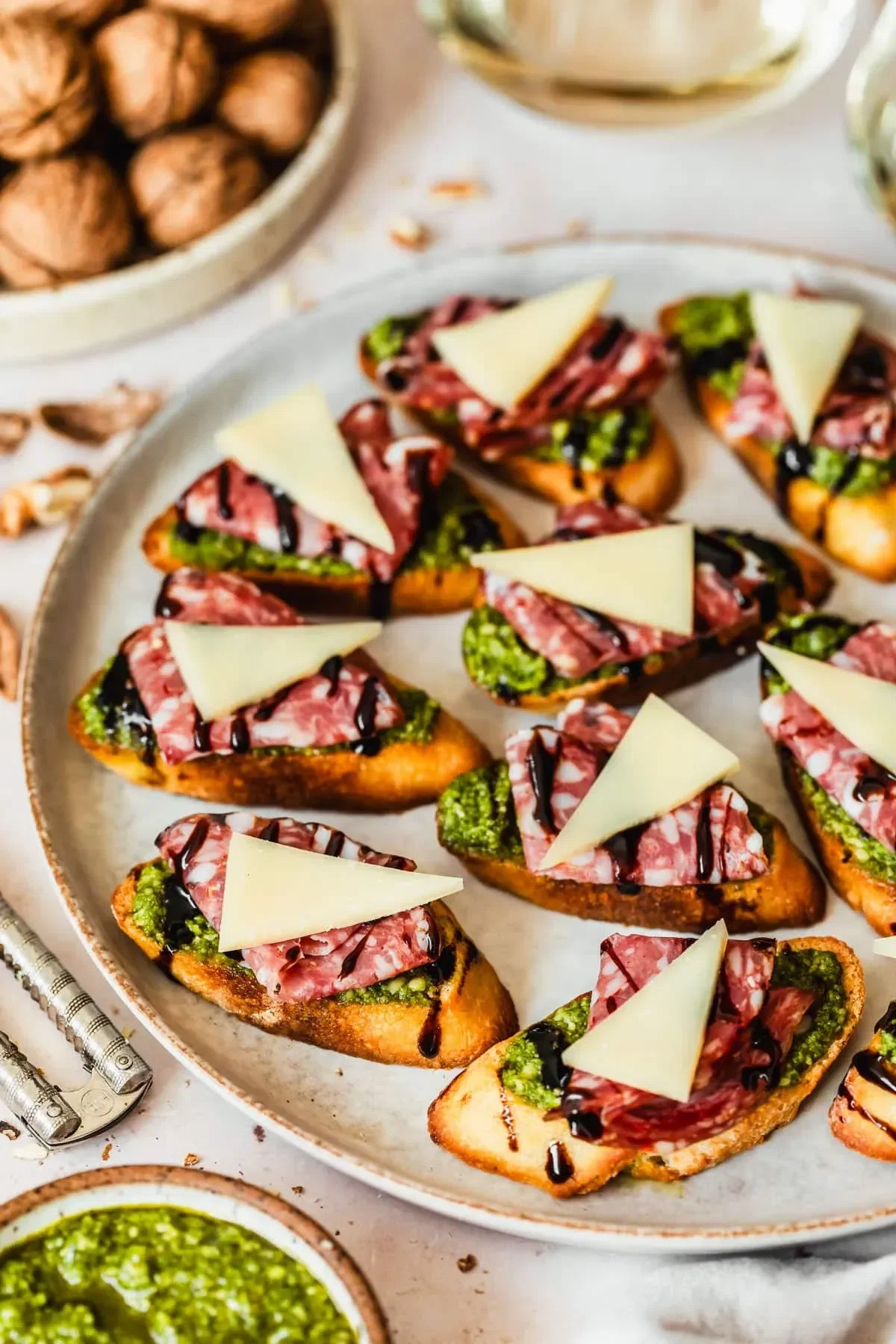 Pesto Crostini with Parmesan & Soppressata