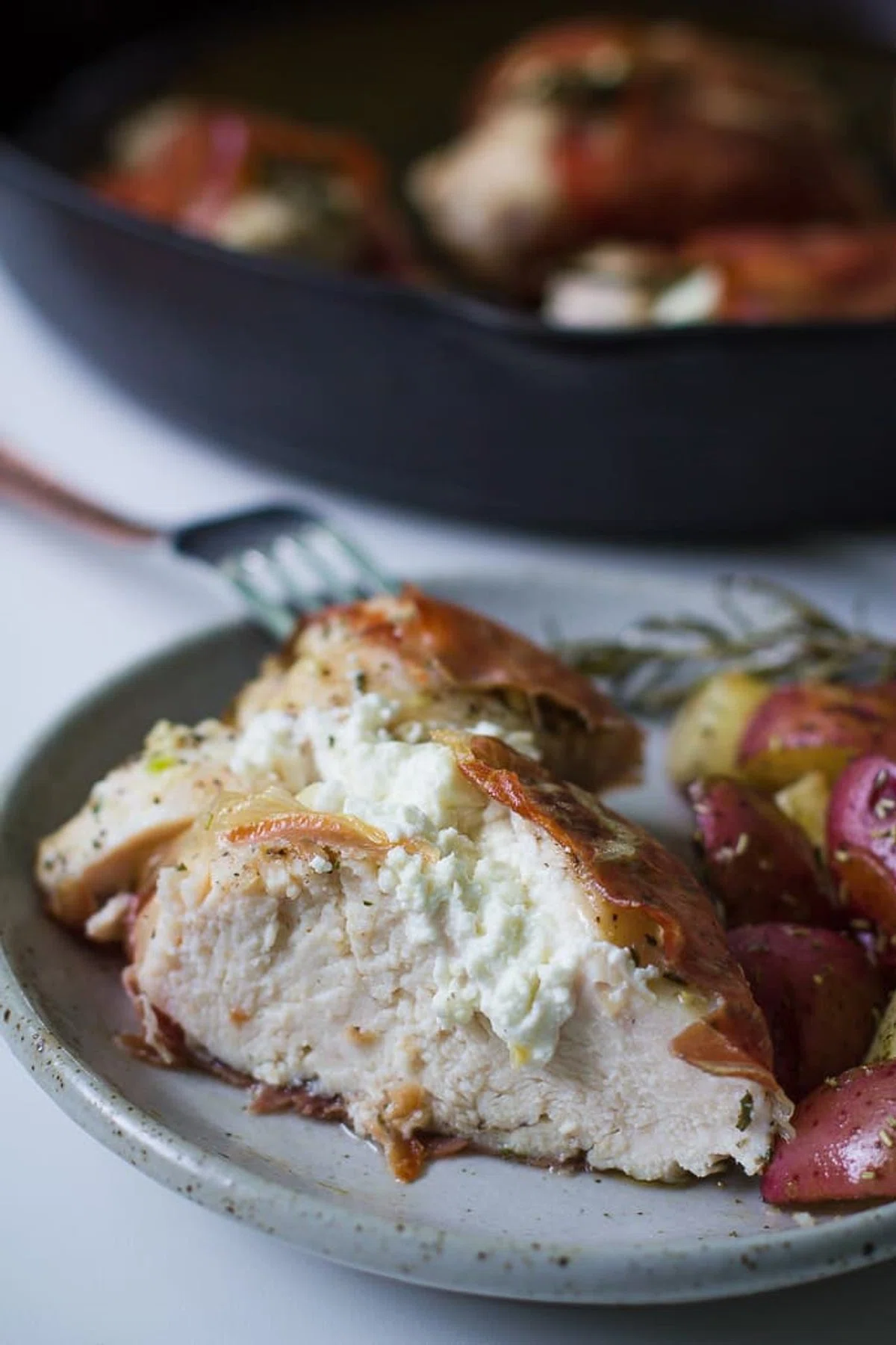 Goat Cheese Stuffed Rosemary Chicken in Prosciutto