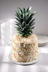Piña Colada Cake with Coconut Swiss Meringue Buttercream
