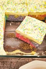 Rainbow Pudding Poke Cake