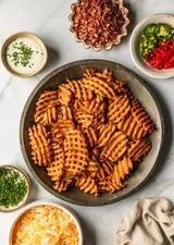 Cheesy Loaded Waffle Fries with Bacon