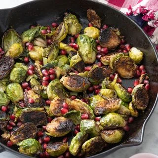 Cast Iron Brussels Sprouts with Pomegranate and Garlic