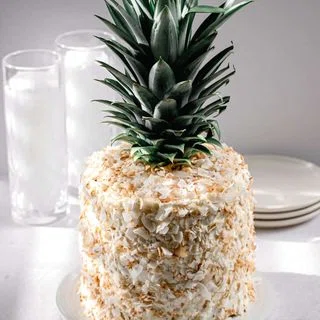 Piña Colada Cake with Coconut Swiss Meringue Buttercream