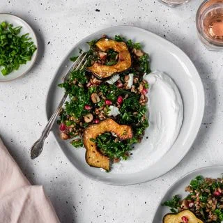 Farro Salad With Acorn Squash, Kale, + Pomegranate
