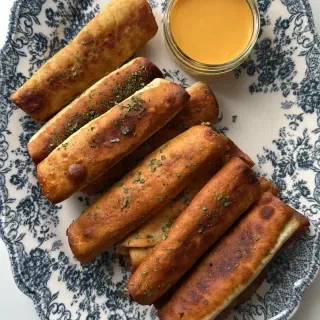 Cheesy Beef Taquitos with Cheddar Sauce