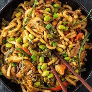 Edamame Stir Fry with Udon Noodles and Peanut Sauce