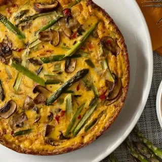 Hashbrown-Crusted Asparagus & Mushroom Quiche