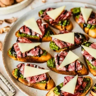 Pesto Crostini with Parmesan & Soppressata