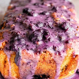Brown Butter Blueberry Fritter Loaf with Vanilla Bean Glaze
