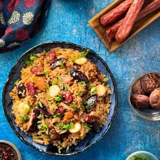 Clay Pot Chicken Rice with Lap Cheong and Shiitake Mushrooms