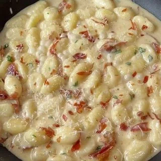 Truffle Cream Gnocchi with Crispy Prosciutto & Roasted Garlic