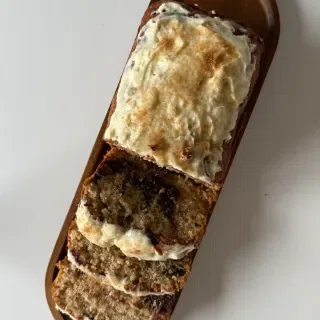 Cinnamon Roll Banana Bread with Cream Cheese Frosting