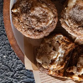 Brown Butter Gingerbread Muffins with Cream Cheese Swirl