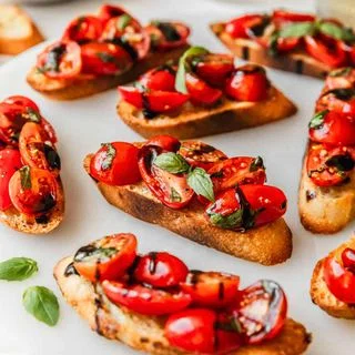 Gorgeous Tomato Bruschetta on Garlicky Crostini