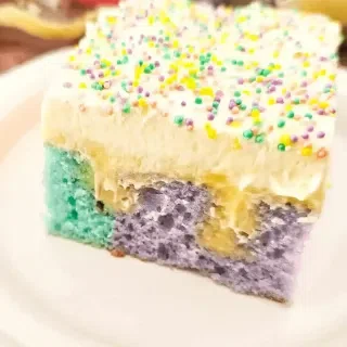 Rainbow Pudding Poke Cake