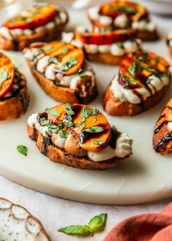 Whipped Ricotta Crostini with Juicy Peaches