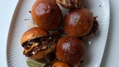 Birria Sliders with Caramelized Onions