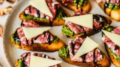 Pesto Crostini with Parmesan & Soppressata