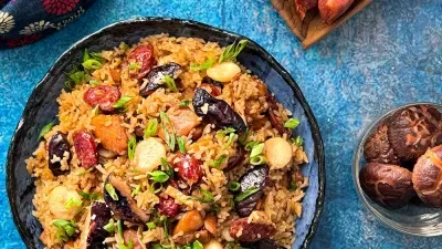 Clay Pot Chicken Rice with Lap Cheong and Shiitake Mushrooms