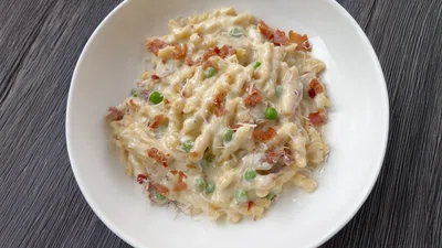 Creamy Gemelli Pasta with Peas & Prosciutto